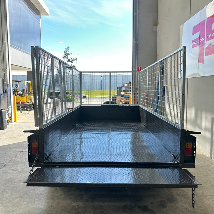 10x5 Tipper Trailer with Slide in ramps and 900mm Cage